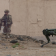 Photo of robotic dog with Army soldiers